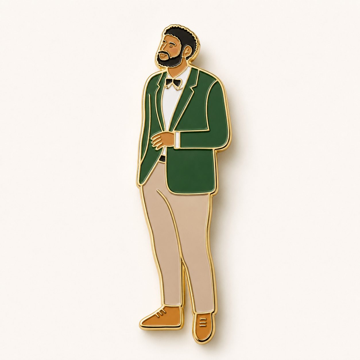 Custom enamel pin of a man in a green dinner jacket and bow tie